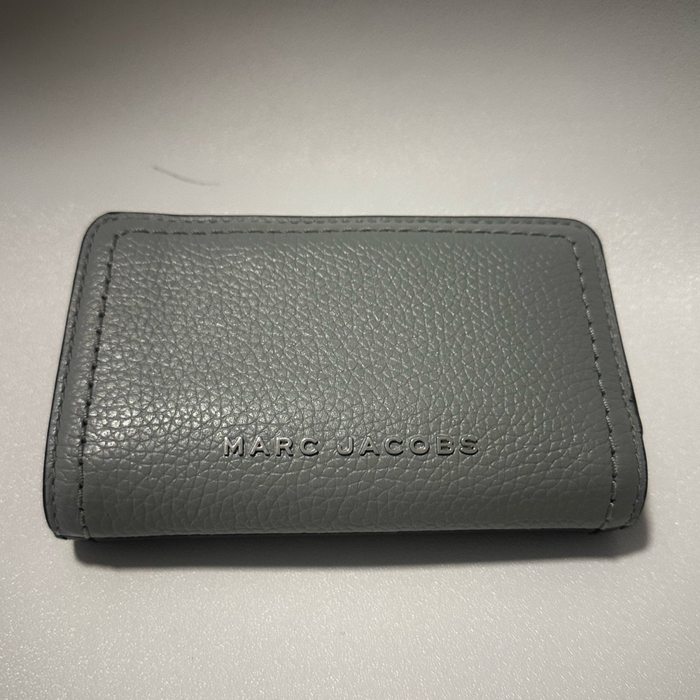 Marc Jacobs Grey and Black zipper wallet. snapped card holder and zip side.